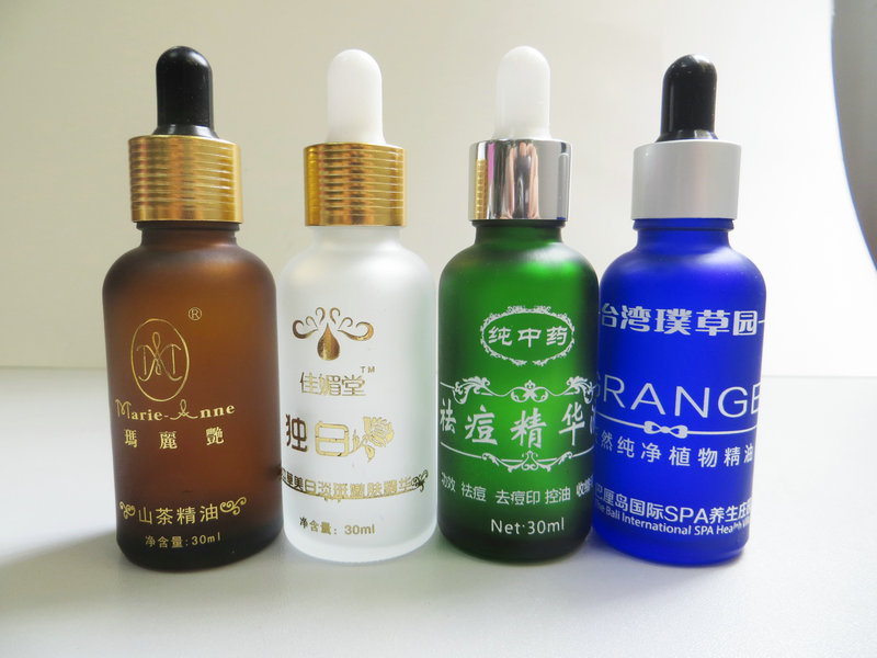 精油瓶高温丝印厂,精油瓶丝印烫金厂,精油瓶磨砂蒙砂厂